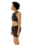 front side view of Jazzy, who had firm C cups, modeling the Active Top in black