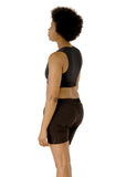 side view of Jazzy, who had firm C cups, modeling the Active Top in black