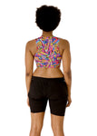 back view of Jazzy, who had firm C cups, modeling the Active Top in the original Arcade print