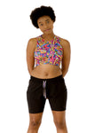 front view of Jazzy, who had firm C cups, modeling the Active Top in the original Arcade print