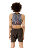 back view of Kali modeling the Active Top in the nearly sold-out Paint Splatter print